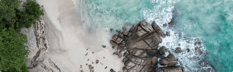 Picturesque bays and sandy beaches surrounded by tropical greenery